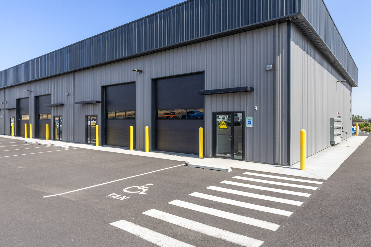 FlexSpace Business Centers Richland exterior flex space with large garage doors and parking.