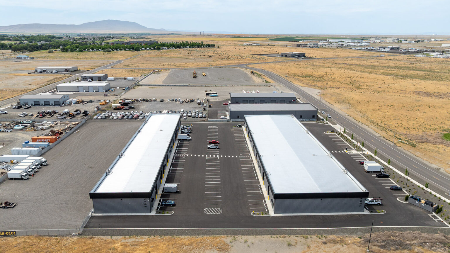 FlexSpace Business Centers Richland exterior view with large commercial buildings and parking lot.