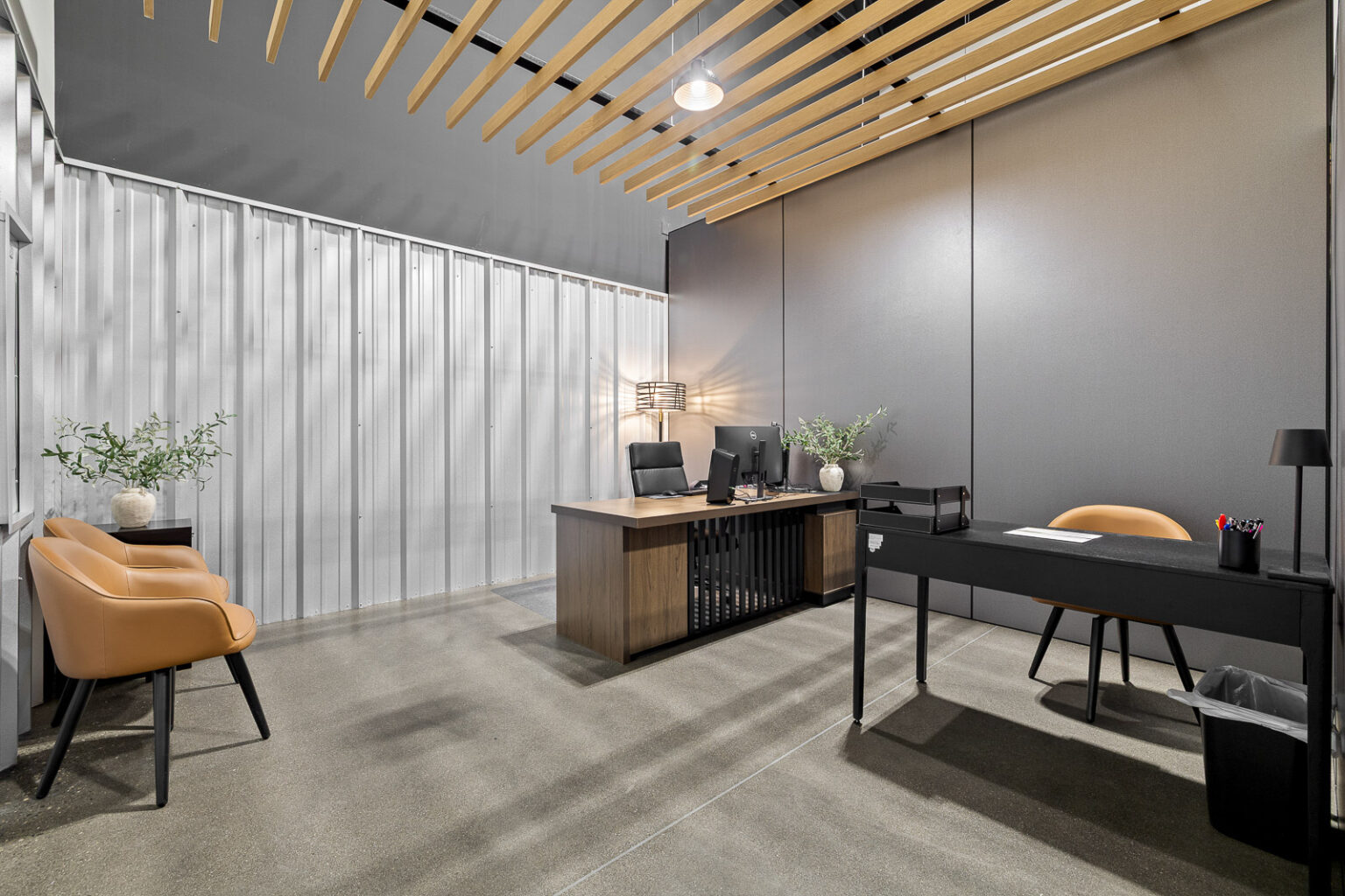 Modern office space with a desk and chairs at FlexSpace Business Centers, Richland.