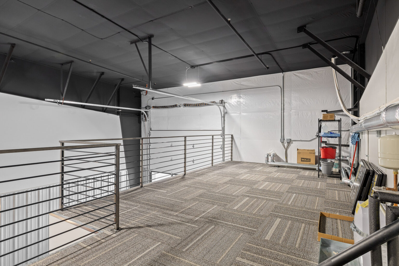 FlexSpace Business Centers Richland office space for rent with mezzanine level and industrial decor.