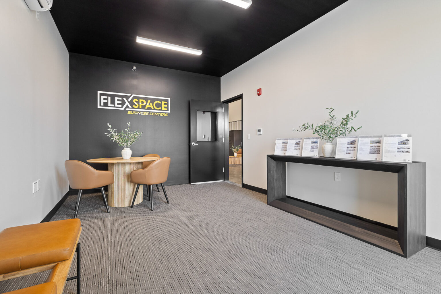 Modern lobby area at FlexSpace Business Centers Richland with seating and decor.