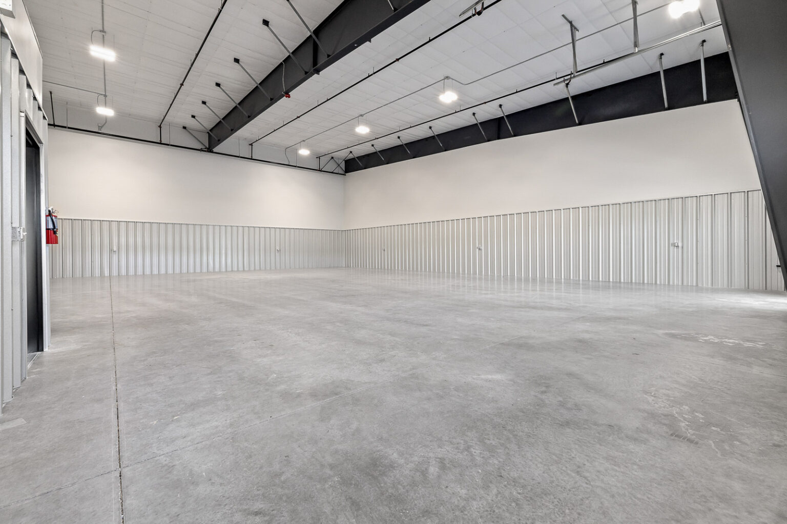 Spacious warehouse interior at FlexSpace Business Centers in Richland, available for lease.