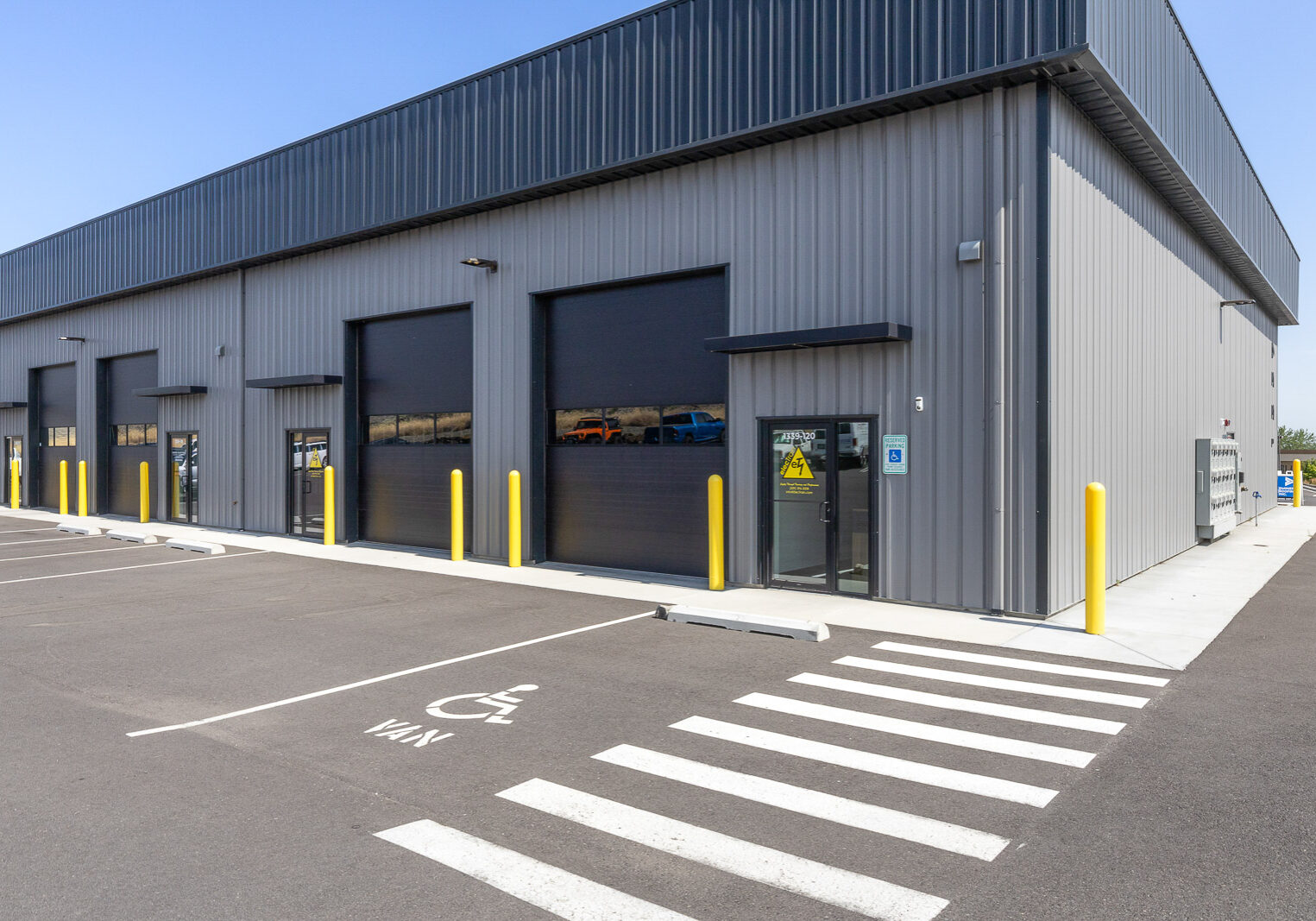 FlexSpace Business Centers Richland exterior flex space with large garage doors and parking.
