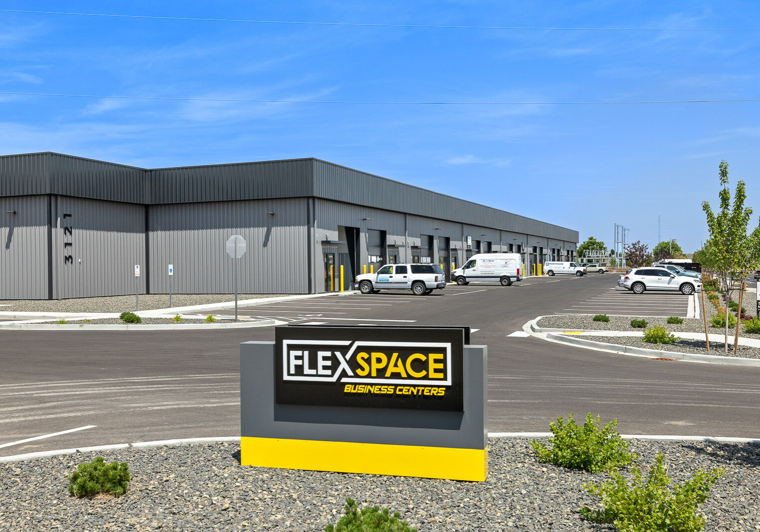 FlexSpace Business Centers exterior on Leslie Road, Richland, showing available flex units for rent.