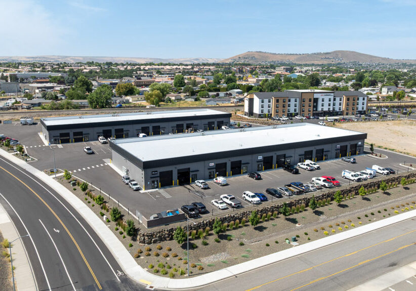 Aerial view of FlexSpace Business Centers on Tapteal Drive in Richland with parking lot and surrounding landscape.